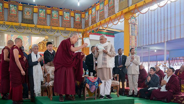 His Holiness the Dalai Lama and Bihar Chief Minister Nitish Kumar releasing "Science and Philosophy in the Indian Buddhist Classics, Vol. 1: The Physical World" in Bodhgaya, Bihar, India on January 7, 2018. Photo by Lobsang Tsering