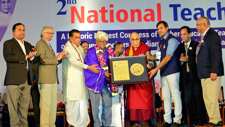 His Holiness the Dalai Lama presenting the Jeevan Gaurav Puraskar Awards at the 2nd National Teachers' Congress Inaugural Ceremony in Pune, Maharashtra, India on January 10, 2018. Photo by Lobsang Tsering