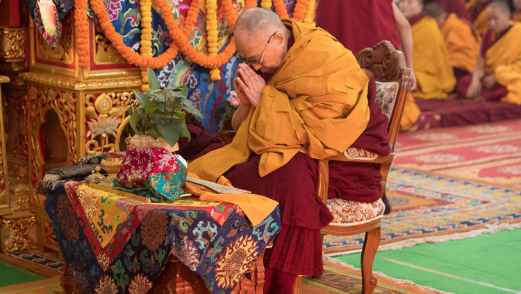 His Holiness the Dalai Lama performing preliminary procedures to prepare himself to grant an Avalokiteshvara empowerment on the second day of his teachings in Bodhgaya, Bihar, India on January 15, 2018. Photo by Manuel Bauer