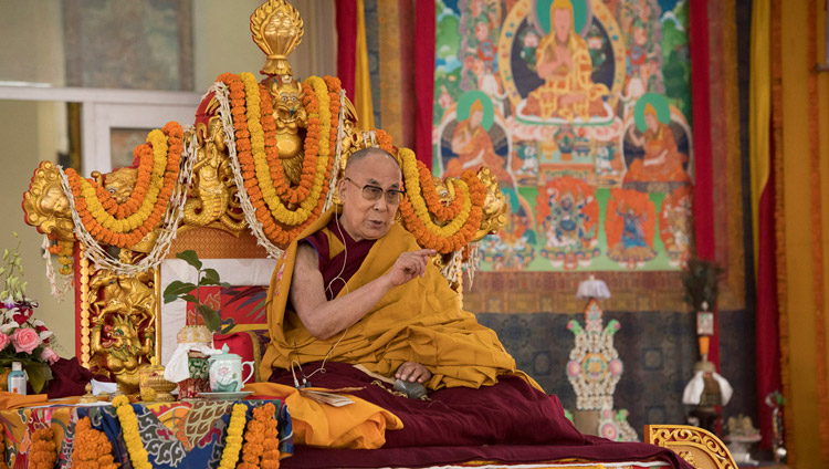 His Holiness the Dalai Lama addressing the crowd at the start of the Avalokiteshvara Empowerment in Bodhgaya, Bihar, India on January 16, 2018. Photo by Manuel Bauer