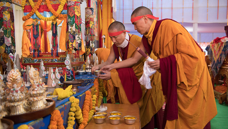 Monks assisting His Holiness the Dalai Lama during the Avalokiteshvara Empowerment in Bodhgaya, Bihar, India on January 16, 2018. Photo by Manuel Bauer