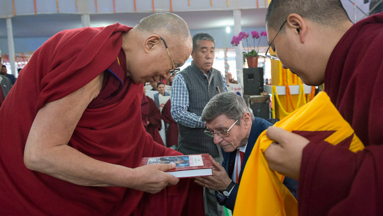 Valentino Giacomin presenting his new book "Universal Ethics" to His Holiness the Dalai Lama at the start of the talk to students organized by his foundation the Alice Project in Bodhgaya, Bihar, India on January 25, 2018. Photo by Lobsang Tsering