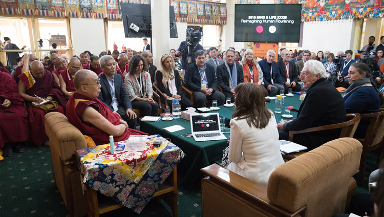 Moderator Tony Phillips introducing Kimberly Schonert-Reichl at the start of the second day of the 33rd Mind & Life Conference at the Main Tibetan Temple in Dharamsala, HP, India on March 13, 2018. Photo by Tenzin Choejor Moderator Tony Phillips introducing Kimberly Schonert-Reichl at the start of the second day of the 33rd Mind & Life Conference at the Main Tibetan Temple in Dharamsala, HP, India on March 13, 2018. Photo by Tenzin Choejor