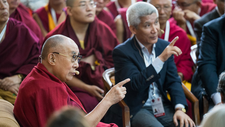Thupten Jinpa and His Holiness the Dalai Lama discussing a point during his presentation on the Buddhist views of attention and meta-awareness on the third day of the Mind & Life Conference at the Main Tibetan Temple in Dharamsala, HP, India on March 14, 2018. Photo by Tenzin Choejor