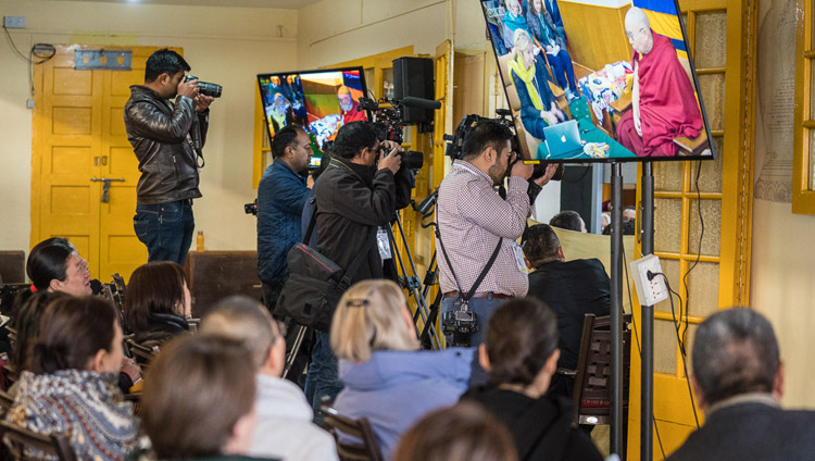 Members of the press photographing the proceedings on the final day of the Mind & Life Conference at the Main Tibetan Temple in Dharamsala, HP, India on March 16, 2018. Photo by Tenzin Choejor