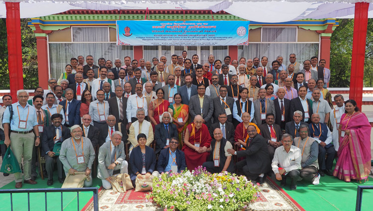 His Holiness the Dalai Lama joins the Vice Chancellors attending the 92nd Annual Meet of Association of Indian Universities after the conclusion of the inaugural session at CIHTS in Sarnath, UP, India on March 19, 2018. Photo by Jeremy Russell