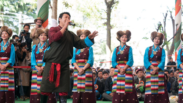 Artistes of the Tibetan Institute of Performing Arts (TIPA) giving a stirring rendition ‘Thank You India’ song at the start of celebrations at the Main Tibetan Temple courtyard in Dharamsala, HP, India on March 31, 2018. Photo by Tenzin Choejor