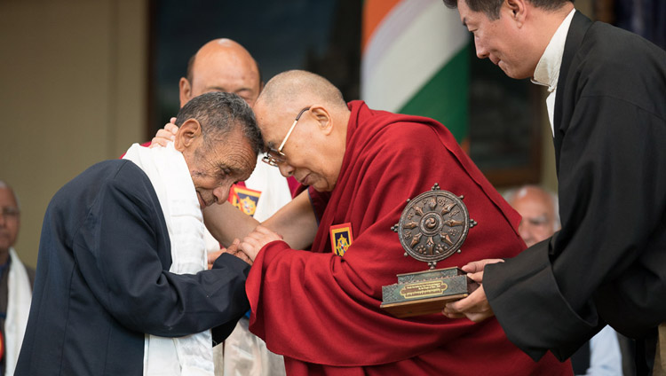 His Holiness the Dalai Lama embracing Naren Chandra Das, the sole known survivor of the seven Assam Rifles personnel who received him at the Indian border in 1959, during the Thank You India celebrations in Dharamsala, HP, India on March 31, 2018. Photo by Tenzin Choejor