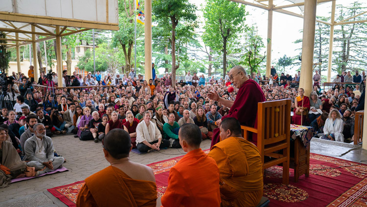 His Holiness the Dalai Lama addressing the crowd of tourists from over 68 countries and India gathered at the Main Tibetan Temple courtyard in Dharamsala, HP, India on April 16, 2018. Photo by Tenzin Choejor