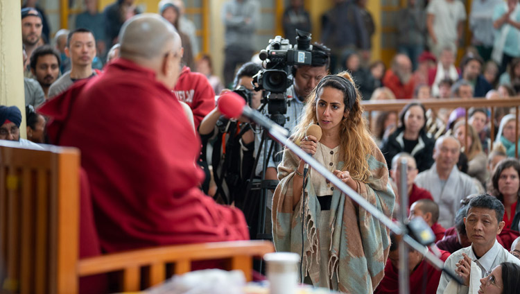 A member of the audience asking His Holiness the Dalai Lama a question during his talk to visitors from India and abroad at the Main Tibetan Temple courtyard in Dharamsala, HP, India on April 16, 2018. Photo by Tenzin Choejor A member of the audience asking His Holiness the Dalai Lama a question during his talk to visitors from India and abroad at the Main Tibetan Temple courtyard in Dharamsala, HP, India on April 16, 2018. Photo by Tenzin Choejor