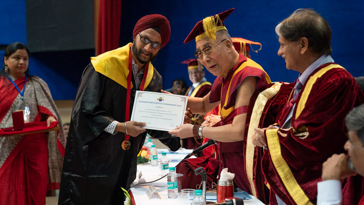 His Holiness the Dalai Lama presenting awards and certificates during the Lal Bahadur Shastri Institute of Management Convocation in New Delhi, India on April 23, 2018. Photo by Tenzin Choejor