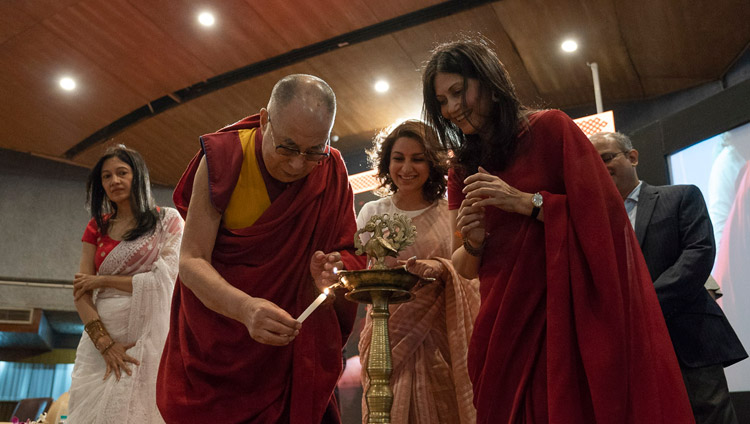 His Holiness the Dalai Lama and his hosts lighting a traditional lamp to open the event at the IIT auditorium in New Delhi, India on April 24, 2018. Photo by Tenzin Choejor