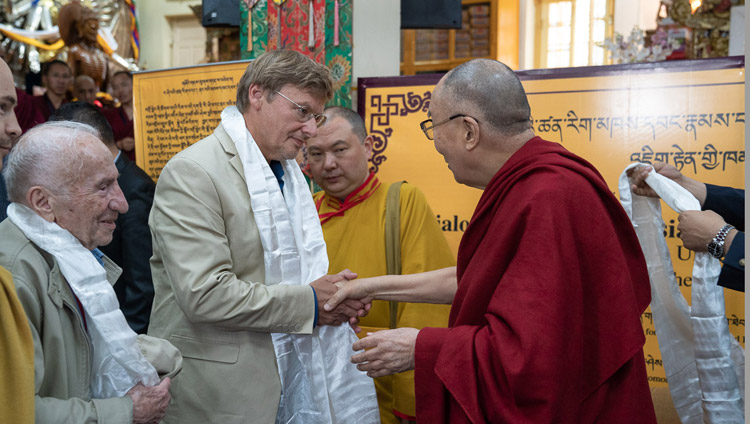 His Holiness the Dalai Lama thanking the Russian scholars with presentations of traditional Tibetan scarves at the conclusion of the Dialogue between Russian and Buddhist Scholars at the Main Tibetan Temple in Dharamsala, HP, India on May 4, 2018. Photo by Tenzin Choejor