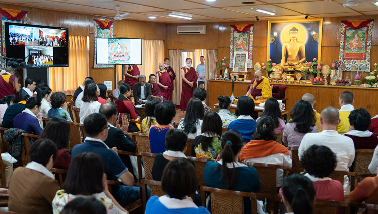 His Holiness the Dalai lama giving the White Manjushri Permission on the second day of his meeting with groups from Vietnam at his residence in Dharamsala, HP, India on May 22, 2018. Photo by Tenzin Choejor