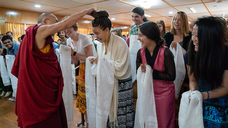 His Holiness the Dalai Lama greeting members of the audience before his meeting with students and teachers at his residence in Dharamsala, HP, India on June 1, 2018. Photo by Tenzin Choejor