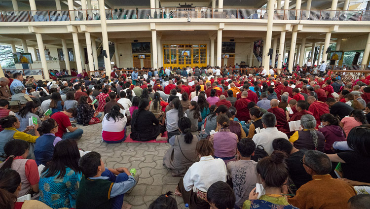 Many of the over 9,000 people attending His Holiness the Dalai Lama's teachings watching on TV screens in the Main Tibetan Temple courtyard in Dharamsala, HP, India on June 6, 2018. Photo by Tenzin Phuntsok