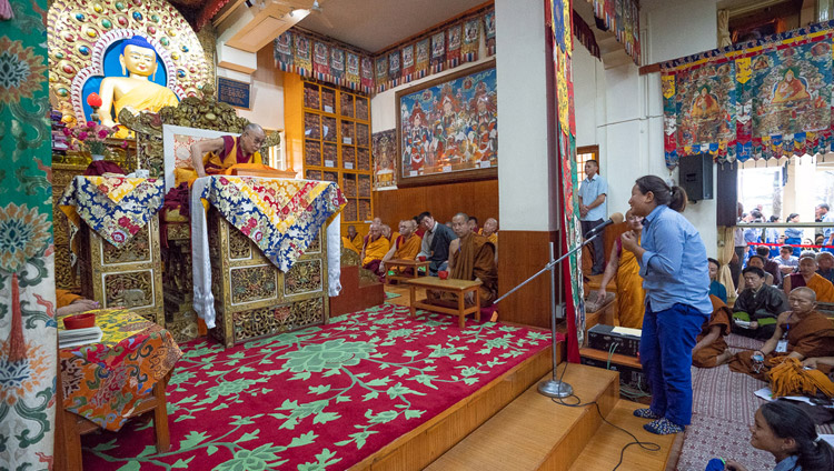 A student asking His Holiness the Dalai Lama a question during a break on the second day of teachings for young Tibetan students at the Main Tibetan Temple in Dharamsala, HP, India on June 7, 2018. Photo by Tenzin Phuntsok