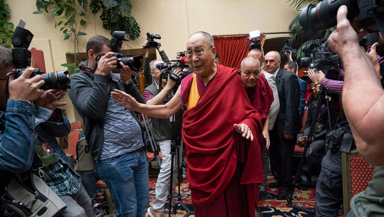 His Holiness the Dalai Lama greeting members of the media as he arrives for their meeting in Vilnius, Lithuania on June 13, 2018. Photo by Tenzin Choejor