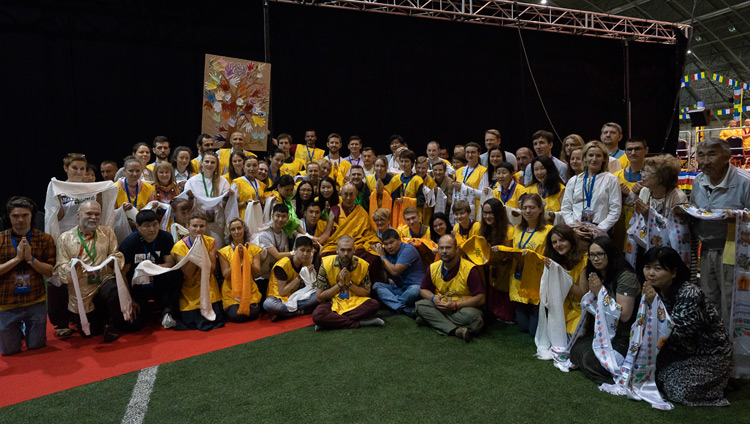 His Holiness the Dalai Lama with volunteers that worked during his three day teaching in Riga, Latvia on June 18, 2018. Photo by Tenzin Choejor