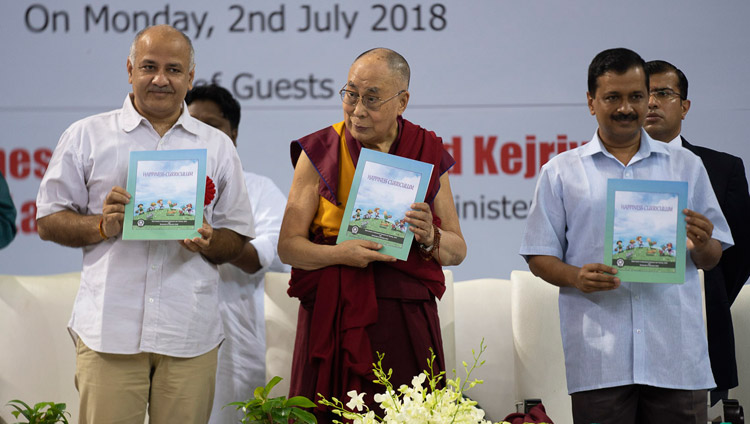 Delhi Deputy Chief Minister Manish Sisodia, His Holiness the Dalai Lama and Delhi Chief Minister Arvind Kejriwal releasing the Happiness Curriculum in Delhi Government Schools in New Delhi, India on July 2, 2018. Photo by Tenzin Choejor