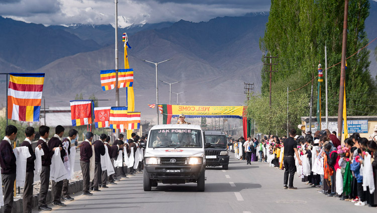 Well-wishers line the road to welcome His Holiness the Dalai Lama as his motorcade makes its way from the airport to his residence in Leh, Ladakh, J&K, India on July 3, 2018. Photo by Tenzin Choejor