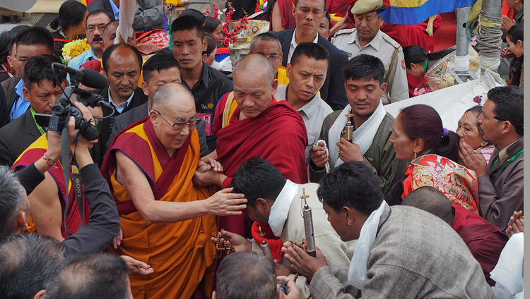 His Holiness the Dalai Lama interacting with members of the crowd gathered outside the Leh Jokhang as he prepares to depart for his residence in Leh, Ladakh, J&K, India on July 4, 2018. Photo by Jeremy Russell