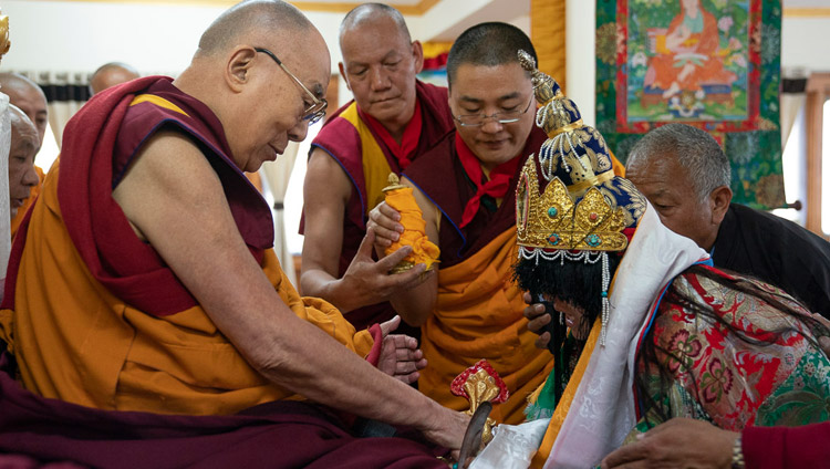 The oracle of Dorje Yamakyong paying respect to His Holiness the Dalai Lama during  early morning prayers on his 83rd birthday at his residence in Leh, Ladakh, J&K, India on July 6, 2018. Photo by Tenzin Choejor