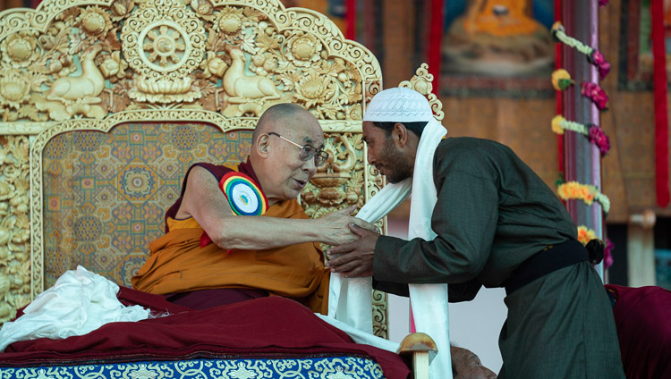 His Holiness the Dalai Lama thanking President of the Nubra Valley Muslim community, Muhammad Akram for his speech at the Inauguration of the Great Summer Debate at Samstanling Monastery in Sumur, Ladakh, J&K, India on July 15, 2018. Photo by Tenzin Choejor