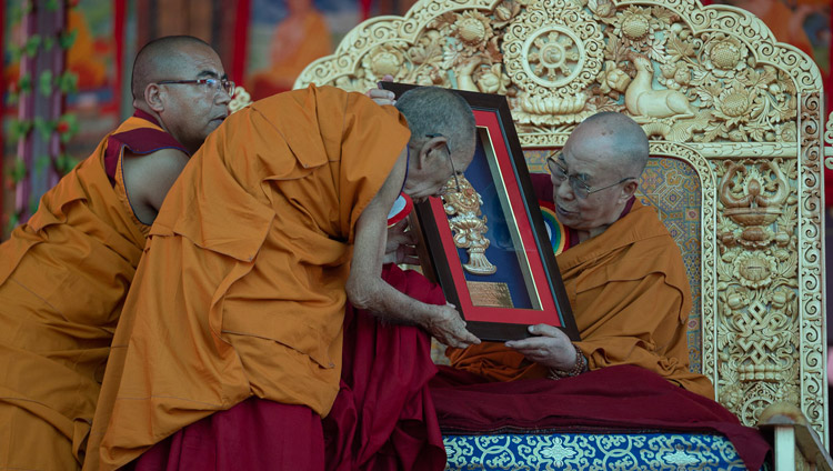 Ganden Trisur, Rizong Rinpoche, presenting His Holiness the Dalai Lama with a memento of the Inauguration of the Great Summer Debate at Samstanling Monastery in Sumur, Ladakh, J&K, India on July 15, 2018. Photo by Tenzin Choejor