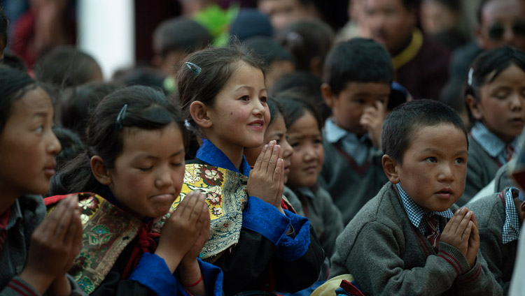 Students reciting the 'Praise to Manjushri' with His Holiness the Dalai Lama during his visit to Lamdon Model School in Padum, Zanskar, J&K, India on July 24, 2018. Photo by Tenzin Choejor