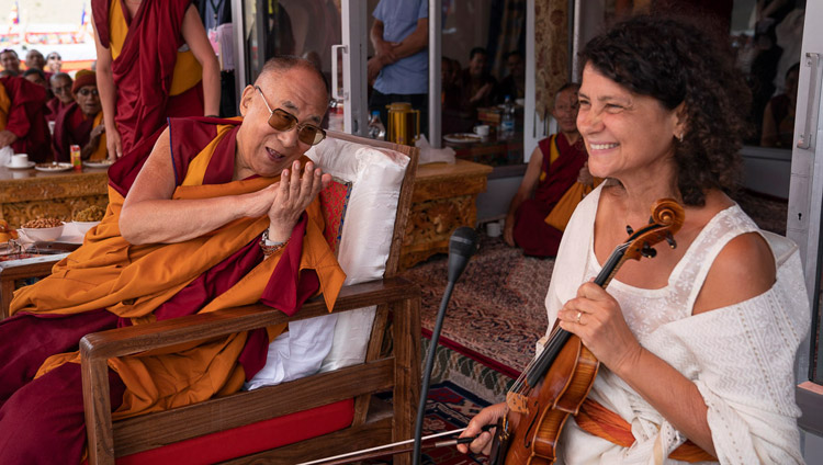 His Holiness the Dalai Lama thanking Czech musician Iva Bittova for her performance at the conclusion of his talk at Spring Dales Public School in Mulbekh, Ladakh, J&K, India on July 26, 2018. Photo by Tenzin Choejor