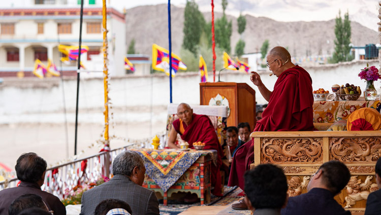 Thiksey Rinpoche looks on as His Holiness the Dalai Lama addresses the crowd of Tibetans, young and old, at Tibetan Children’s Village School Choglamsar in Leh, Ladakh, J&K, India on August 1, 2018. Photo by Tenzin Choejor