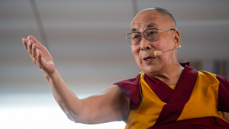 His Holiness the Dalai Lama gestures as he answers questions from the audience during his talk at Eliezer Joldan Memorial College in Leh, Ladakh, J&K, India on August 2, 2018. Photo by Tenzin Choejor