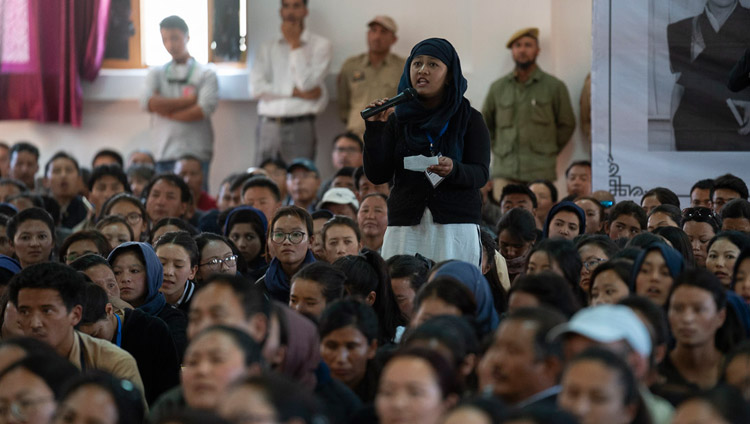 A student asking His Holiness the Dalai Lama during his talk at Eliezer Joldan Memorial College in Leh, Ladakh, J&K, India on August 2, 2018. Photo by Tenzin Choejor