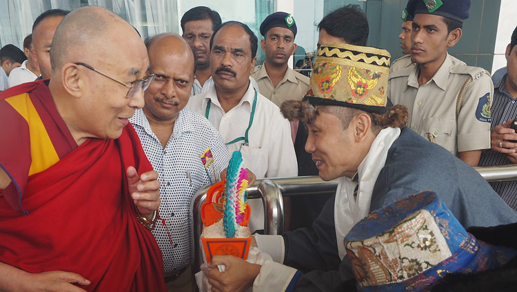 His Holiness the Dalai Lama receiving a traditional welcome on his arrival at the airport in Dabolim, Goa, India on August 7, 2018. Photo by Jeremy Russell