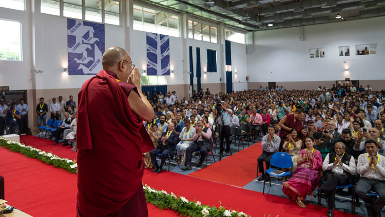 His Holiness the Dalai Lama greeting the audience on his arrival on stage for his talk at the Goa Institute of Management in Sanquelim, Goa, India on August 8, 2018. Photo by Tenzin Choejor His Holiness the Dalai Lama greeting the audience on his arrival on stage for his talk at the Goa Institute of Management in Sanquelim, Goa, India on August 8, 2018. Photo by Tenzin Choejor