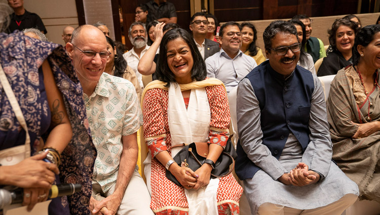 Members of the audience reacting with laughter to comments by His Holiness the Dalai Lama during his talk in Bengaluru, Karnataka, India on August 12, 2018. Photo by Tenzin Choejor