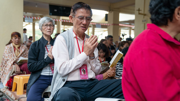 Some of the more than 1200 people from South-east Asian countries reciting prayers at the start of His Holiness the Dalai Lama's teaching at the Main Tibetan Temple in Dharamsala, HP, India on September 4, 2018. Photo by Tenzin Choejor