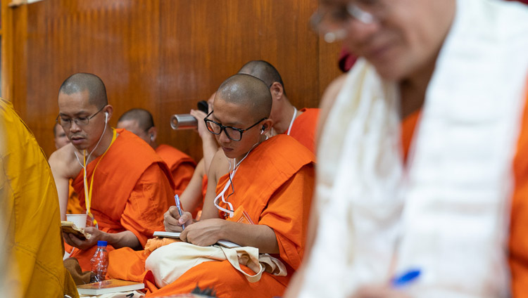 Members of the Thai monastic community taking notes during His Holiness the Dalai Lama's teaching at the Main Tibetan Temple in Dharamsala, HP, India on September 4, 2018. Photo by Tenzin Choejor