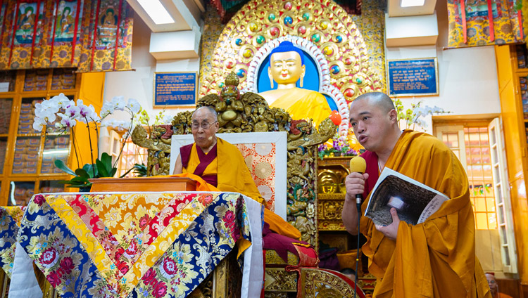 A question from the audience being read for His Holiness the Dalai Lama to answer during his teaching at the Main Tibetan Temple in Dharamsala, HP, India on September 4, 2018. Photo by Tenzin Choejor