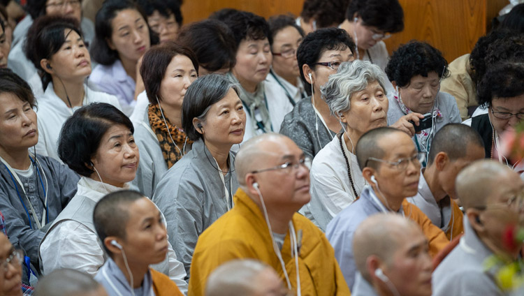 Members of the groups from Southeast Asia listening to His Holiness the Dalai Lama speaking on the second day of his teachings at the Main Tibetan Temple in Dharamsala, HP, India on September 5, 2018. Photo by Tenzin Choejor