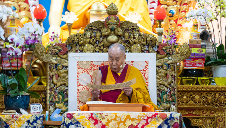 His Holiness the Dalai Lama reading from the text on the second day of his teachings at the Main Tibetan Temple in Dharamsala, HP, India on September 5, 2018. Photo by Lobsang Tsering His Holiness the Dalai Lama reading from the text on the second day of his teachings at the Main Tibetan Temple in Dharamsala, HP, India on September 5, 2018. Photo by Lobsang Tsering
