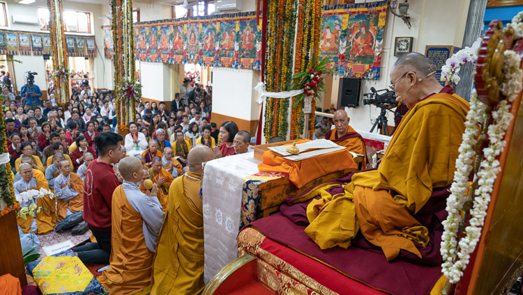 His Holiness the Dalai Lama performing preparatory procedures for the Avalokiteshvara Permission while a group chants the 'Heart Sutra' in Vietnamese on the third day of his teachings in Dharamsala, HP, India on September 6, 2018. Photo by Tenzin Choejor