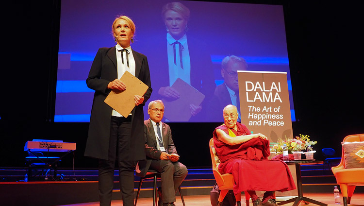 Swedish journalist and television presenter Kattis Ahlstrom introducing His Holiness the Dalai Lama at the start of the program at the Malmö Live in Malmö, Sweden on September 12, 2018. Photo by Jeremy Russell