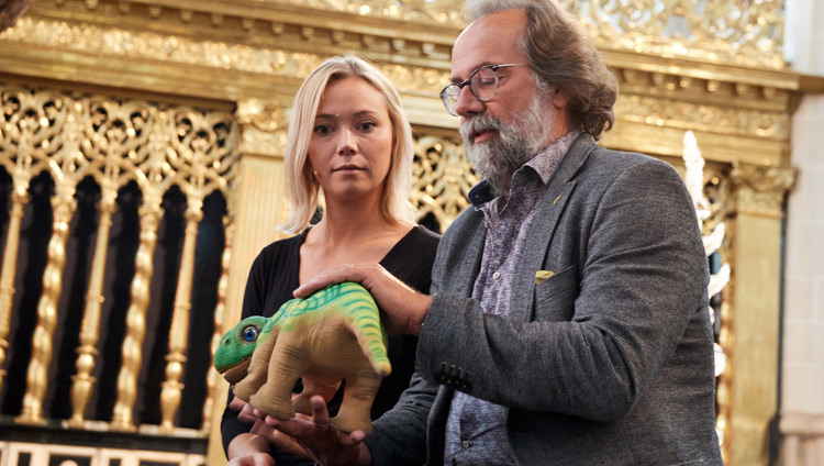 Martin Steinbuch demonstrating his play dinosaur robot during the discussion on ‘Robotics and Telepresence’ at the Nieuwe Kerk in Amsterdam, Netherlands on September 15, 2018. Photo by Olivier Adam