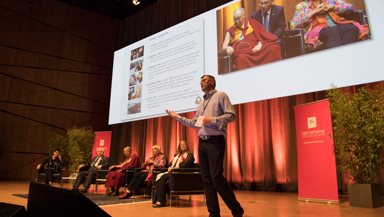 Sinisa Sikman, a Serb from Belgrade, speaking about the resistance to  Milosevic in Serbia at the start of the program at Darmstadtium Congress Hall in Darmstadt, Germany on September 19, 2018. Photo by Manuel Bauer