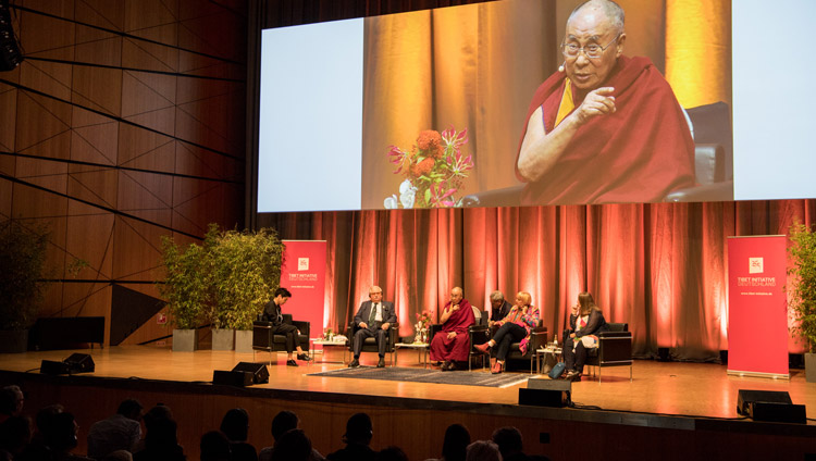 His Holiness the Dalai Lama responding to questions from moderator Dunja Hayali during the discussion on non-violence at Darmstadtium Congress Hall in Darmstadt, Germany on September 19, 2018. Photo by Manuel Bauer