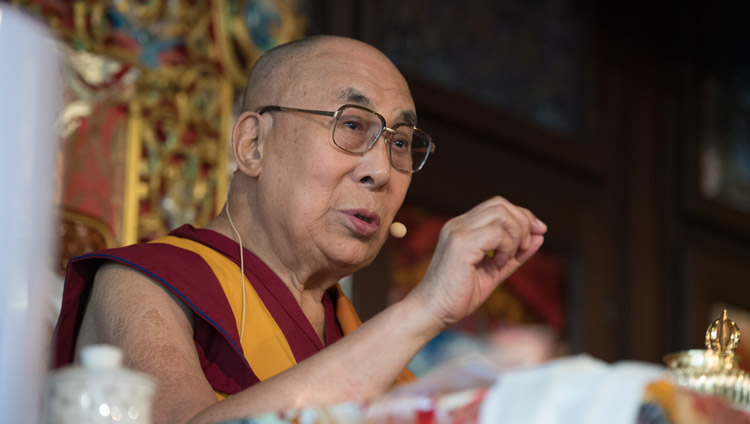 His Holiness the Dalai Lama addressing the audience inside the temple and the crowd listening outside at the ceremony commemorating Tibet Institute Rikon's 50th anniversary in Rikon, Switzerland on September 21, 2018. Photo by Manuel Bauer