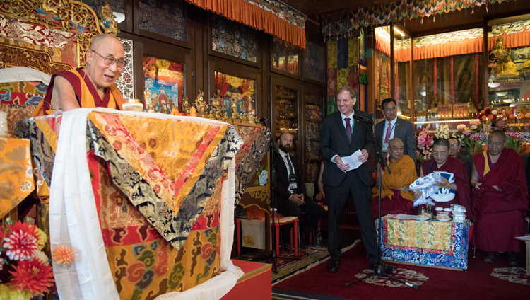His Holiness the Dalai Lama playfully commenting after Philip Hepp, Managing Director of TIR, offered words of thanks at the conclusion of the ceremony commemorating Tibet Institute Rikon's 50th anniversary in Rikon, Switzerland on September 21, 2018. Photo by Manuel Bauer