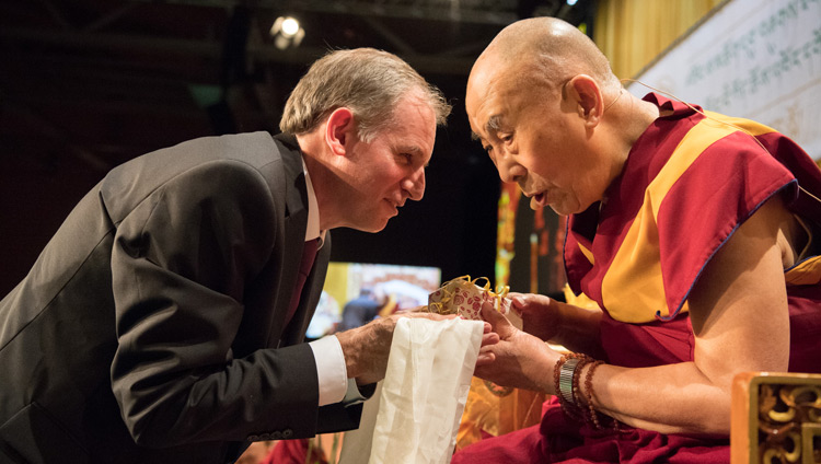 Philip Hepp, Managing Director of TIR, presenting His Holiness the Dalai Lama with a Swiss watch on behalf of the TIR foundation at the conclusion of Tibet Institute Rikon's 50th Anniversary Celebration in Winterthur, Switzerland on September 22, 2018. Photo by Manuel Bauer